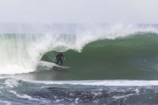 Keo Morrison gets barreled during a winter swell at a remote beachbreak near Dunedin, New Zealand.Photo: Derek Morrison