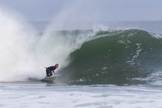 Keo Morrison during a winter swell at a remote beachbreak near Dunedin, New Zealand.Photo: Derek Morrison