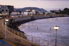 Swimmers on dusk at St Clair, Dunedin, New Zealand.Photo: Derek Morrison
