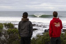 Lineup during a winter swell at a remote beachbreak near Dunedin, New Zealand.Photo: Derek Morrison