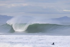 Winter swell at a remote beachbreak near Dunedin, New Zealand.Photo: Derek Morrison