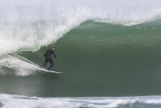 Keo Morrison during a winter swell at a remote beachbreak near Dunedin, New Zealand.Photo: Derek Morrison