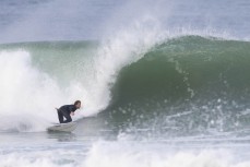 Keo Morrison during a winter swell at a remote beachbreak near Dunedin, New Zealand.Photo: Derek Morrison