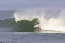 Keo Morrison during a winter swell at a remote beachbreak near Dunedin, New Zealand.Photo: Derek Morrison
