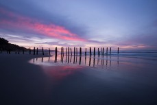 Dawn over the St Clair Poles at St Clair Beach, Dunedin, New Zealand. 