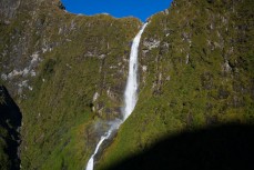 The Sutherland Falls cascade 580m down the rock face in three steps in Fiordland, New Zealand. 