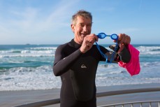 Chris Prendergast prepares to swim around White island at the 2014 White Island Race held by St Clair Surf Lifesaving Club at St Clair Beach, Dunedin, New Zealand on October 25, 2014. 