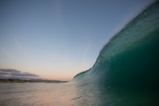 The warped wall of a wave at St Kilda Beach, Dunedin, New Zealand. 