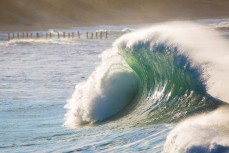 Backwash hits wild surf at St Clair Beach, Dunedin, New Zealand. 