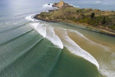 Lineup during a rare swell on the North Coast, Dunedin, New Zealand. Photo: Derek Morrison